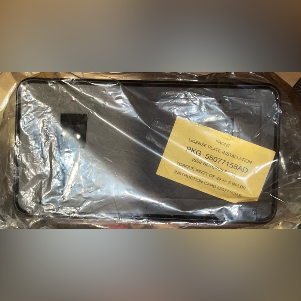 Genuine Mopar 55077158AD Front License Plate Bracket Dodge Ram 2002-2010 NEW